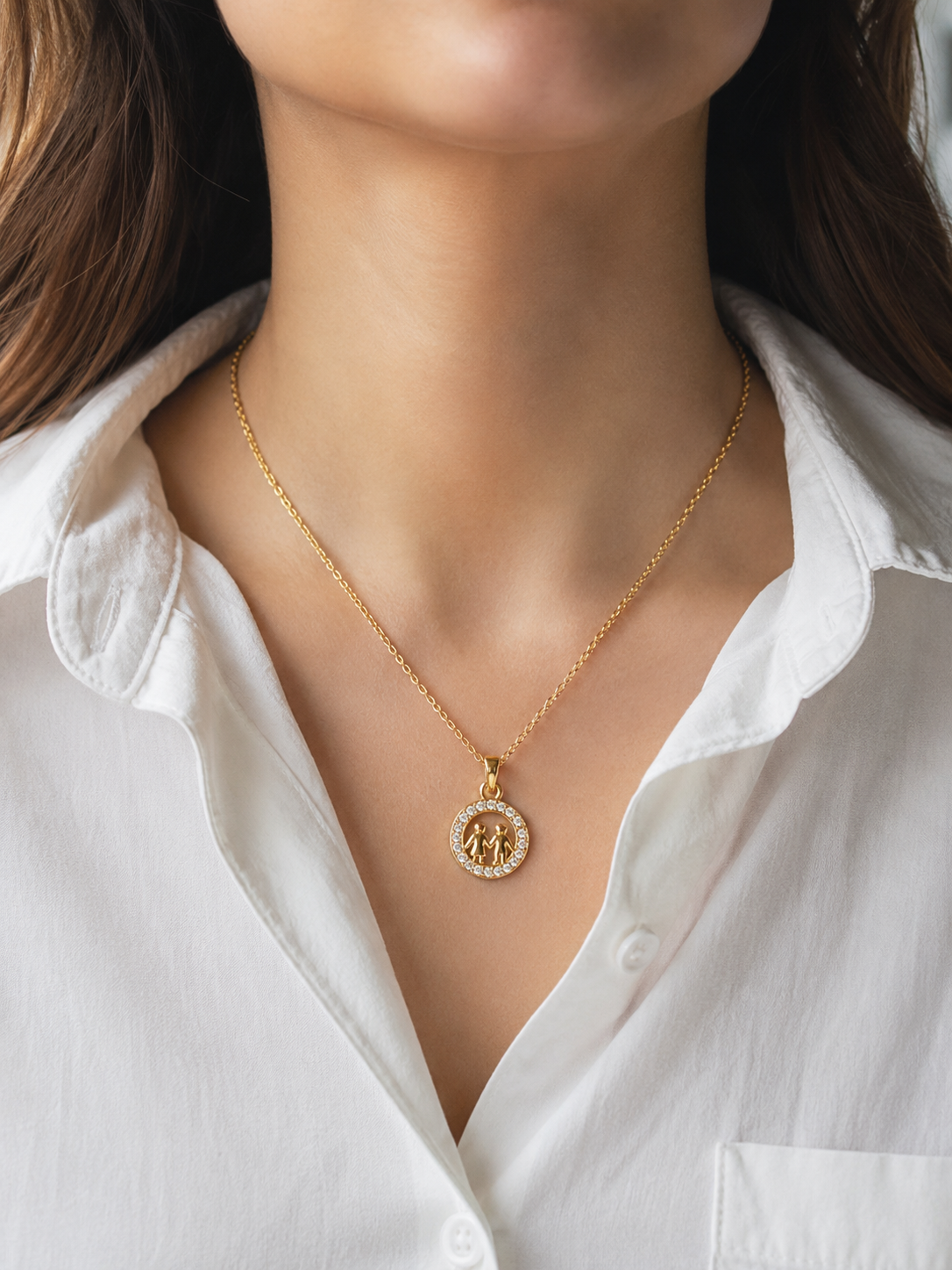 Gemini coin pendant necklace worn by model in office