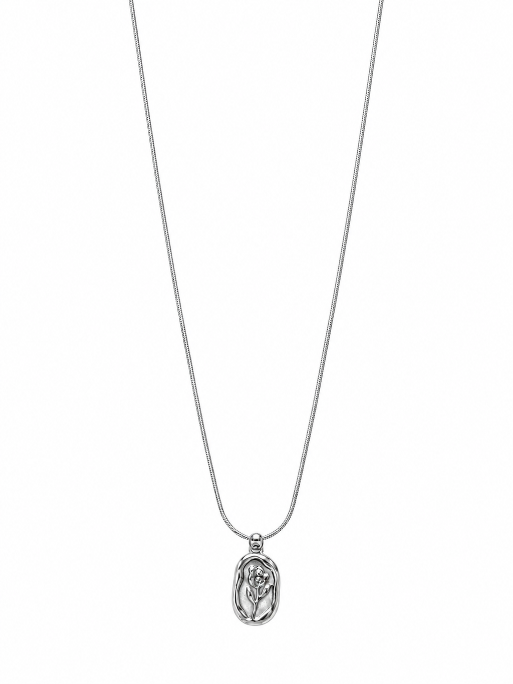 Close-up of silver rose oval pendant