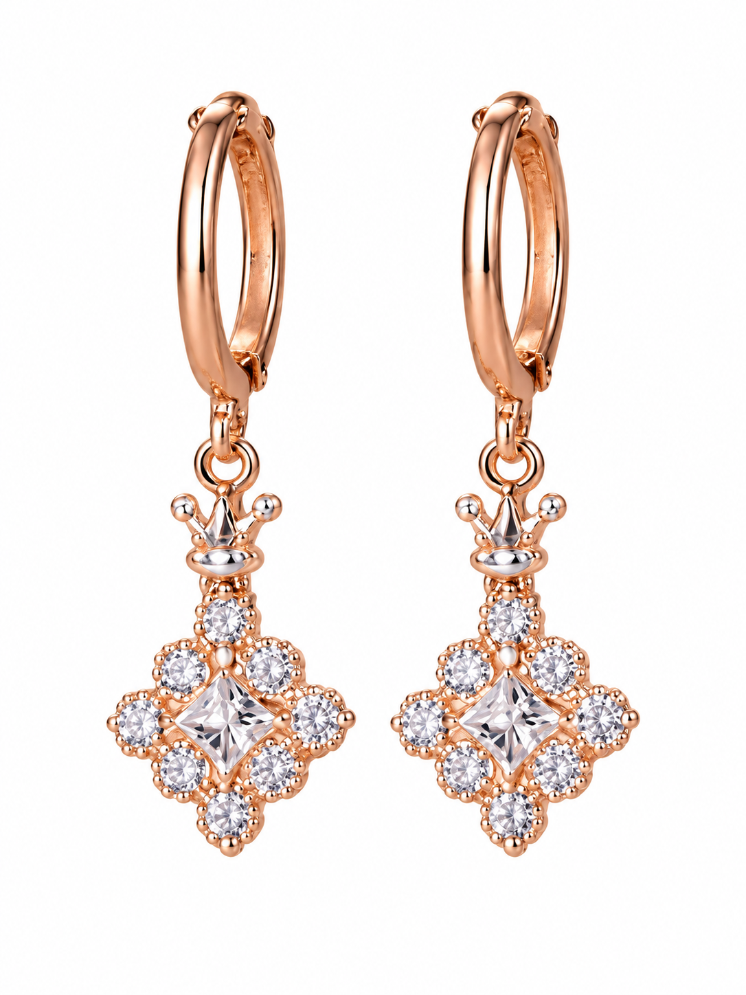 Pair of rose gold hoop earrings with crown-inspired clear crystal drop charms