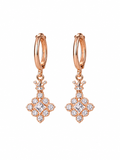 Close-up of rose gold crown crystal drop hoop earrings with square centre stones