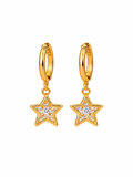 Gold-plated star charm huggie earrings close up