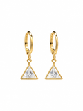 Close-up of gold huggie hoops with triangular crystal drops