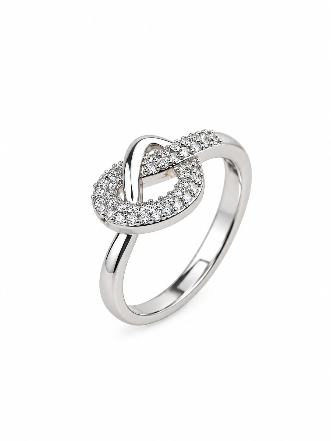 Close-up of silver-tone swirl ring with sparkling clear stones