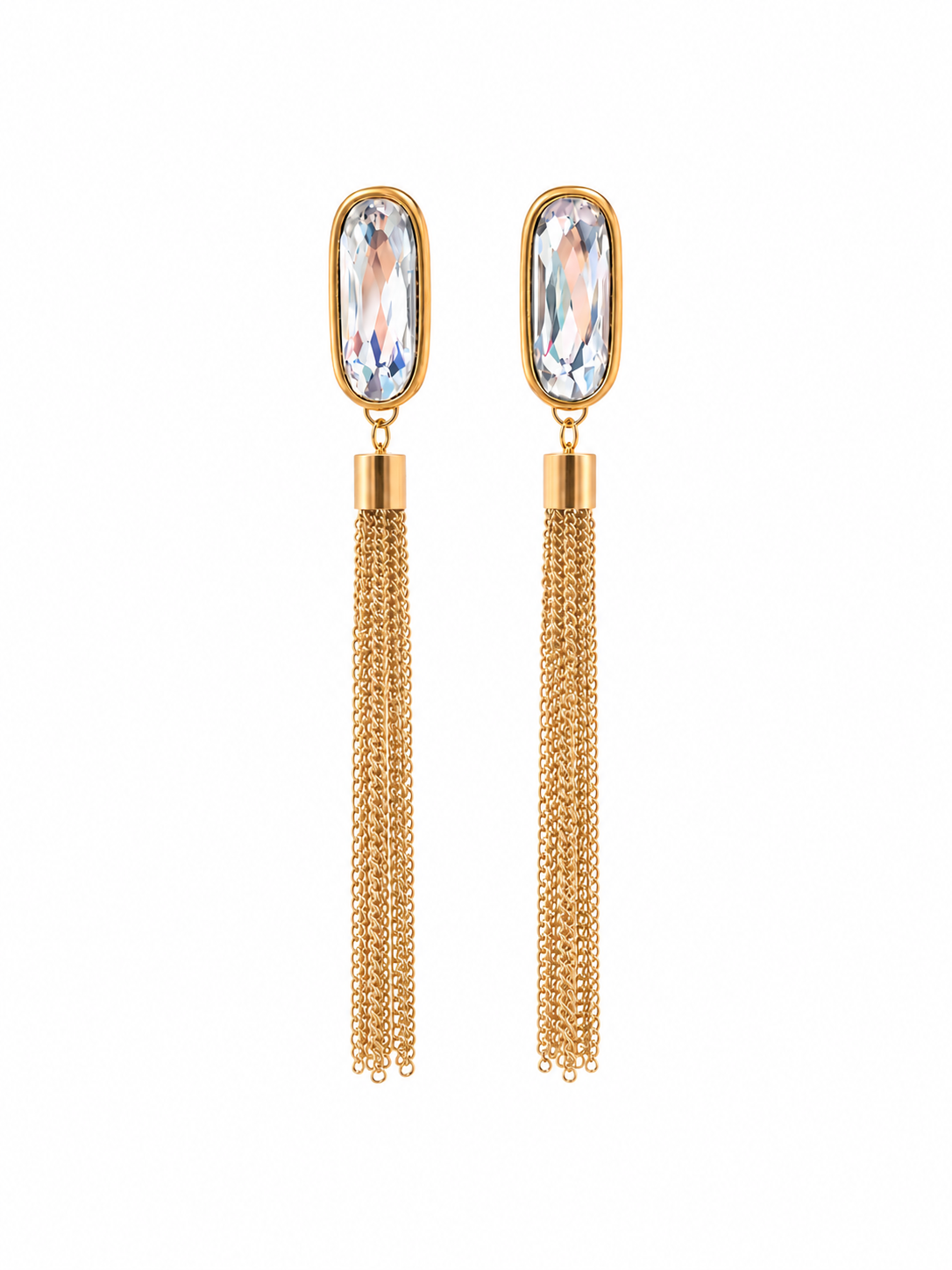 Close-up of gold-tone chain tassel earrings with clear faceted accents