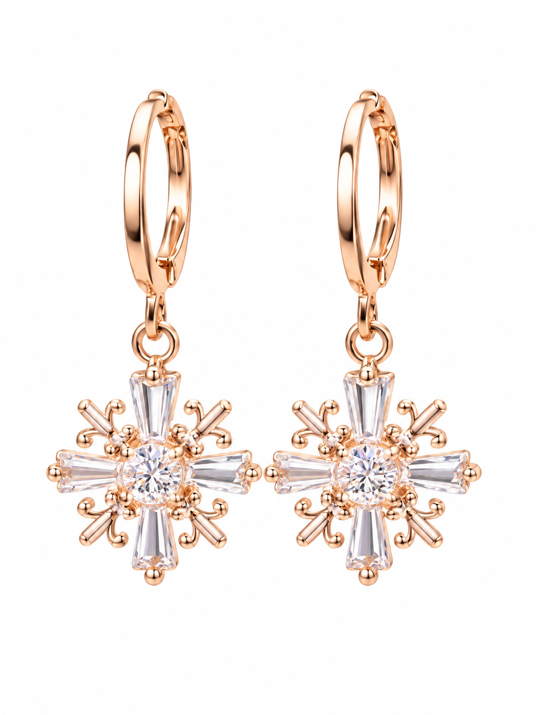 Pair of rose gold-tone hoop earrings with clear crystal snowflake-inspired charms, close-up