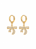 Pair of gold-tone hoop earrings with dangling stone-studded bow charms