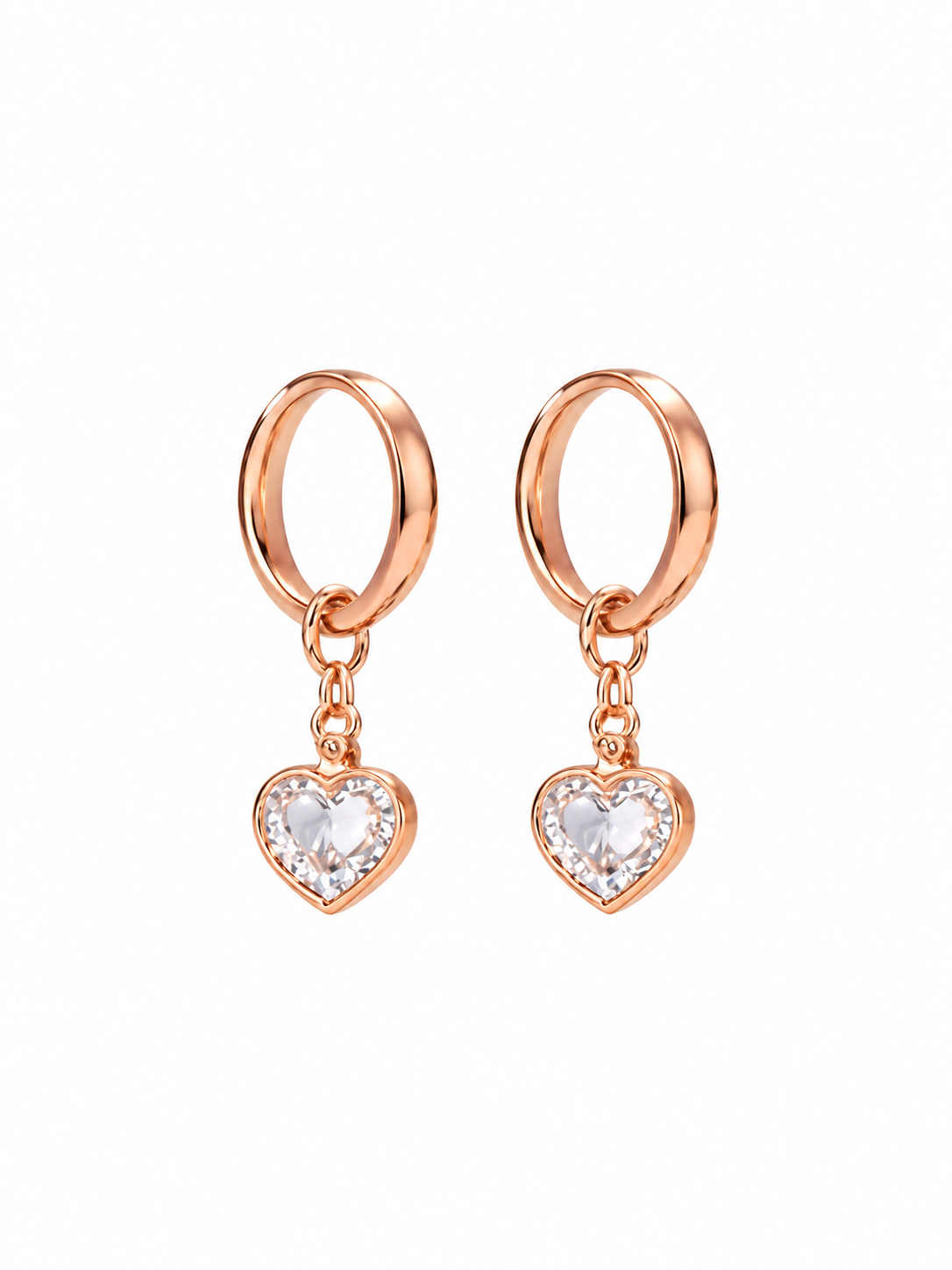 Rose gold-tone heart charm hoop earrings on white background