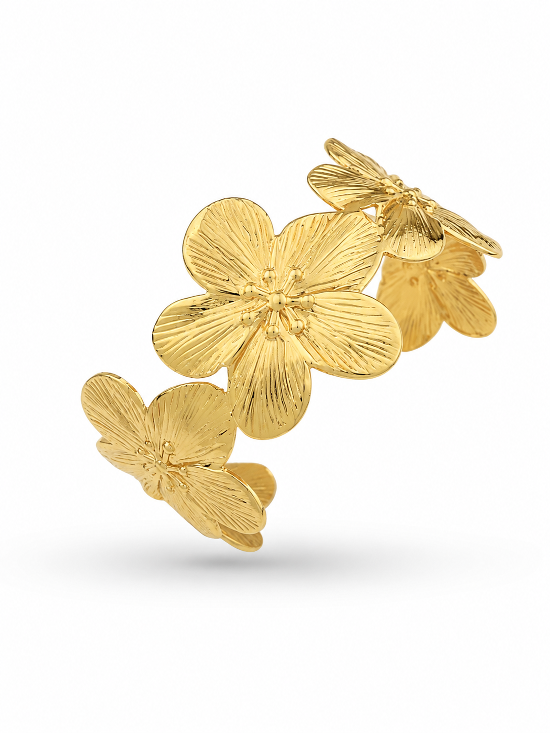 Gold floral cuff bracelet with embossed flower motifs